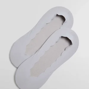 Mignoli invisibili in cotone tinta unita con fascia in silicone di colore grigio