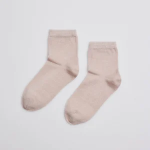 Calzini beige con perle per bambini