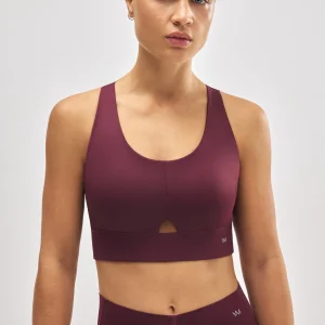 Reggiseno sportivo compressivo con dettaglio di apertura bordeaux